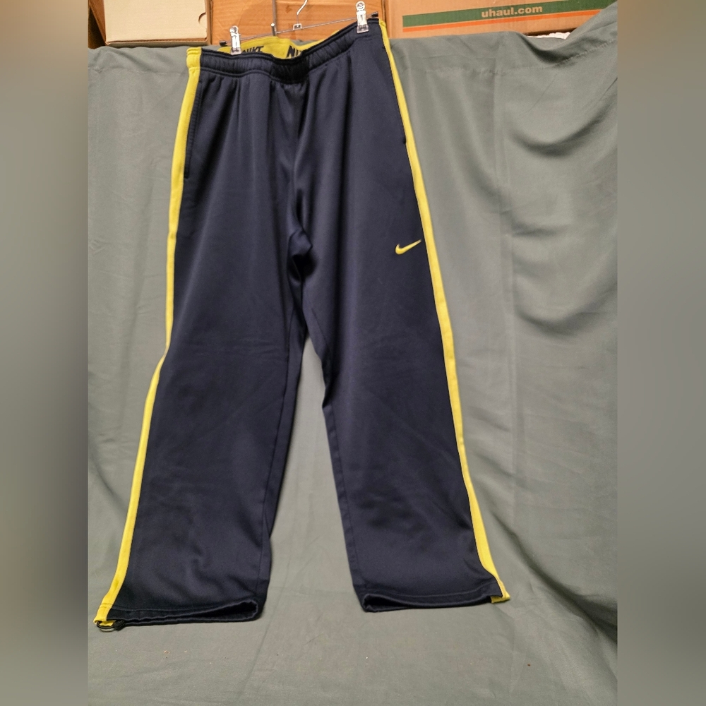 Nike Kids Navy Blue Track Pants with Yellow Accents